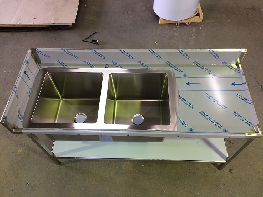 Table with sinks and splash back.